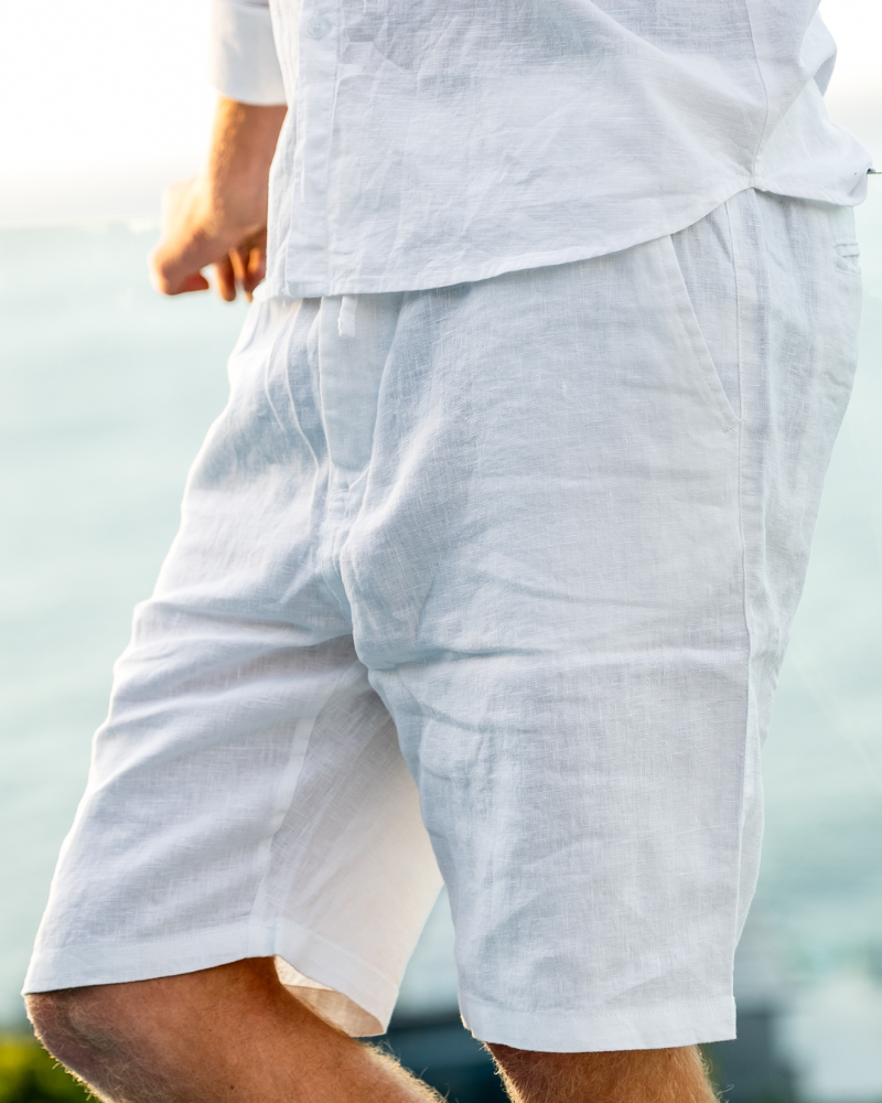 Ischia Linen Shorts front view beige relaxed straight cut linen shorts studio