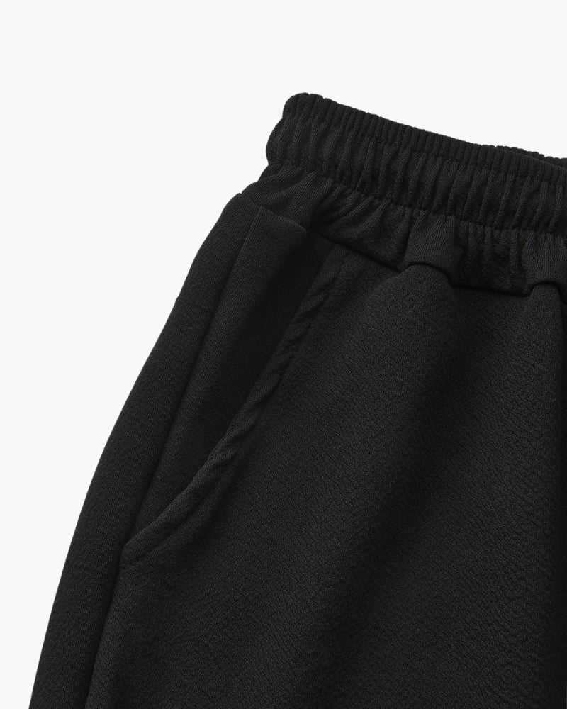 Salerno Cotton Set flat lay black cotton polo and trouser set Pianizzo