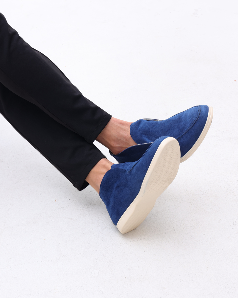 Sorrento Suede Loafer front view black elevated silhouette studio lighting