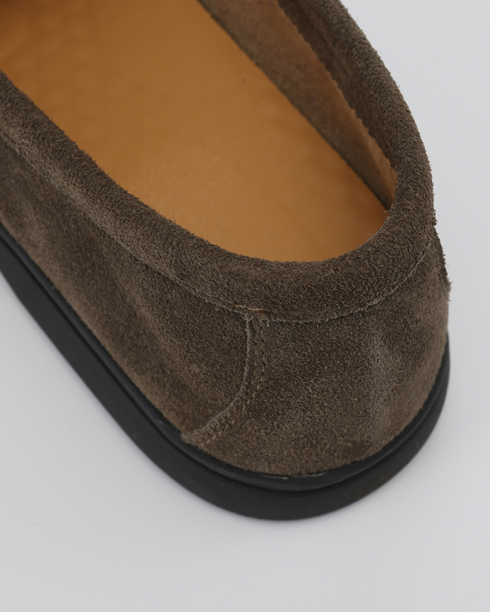 Udine Suede Loafer olive suede side profile black rubber sole and round toe detail