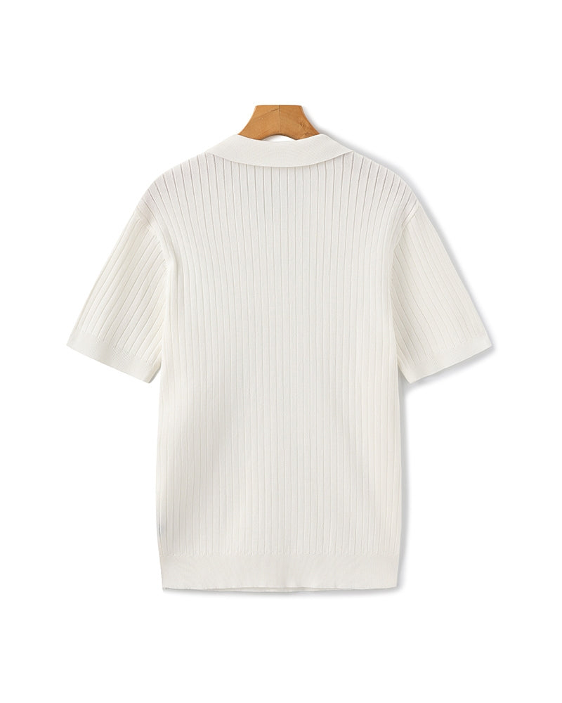 Treviso Cotton Polo on-body view black ribbed polo editorial outdoor natural light