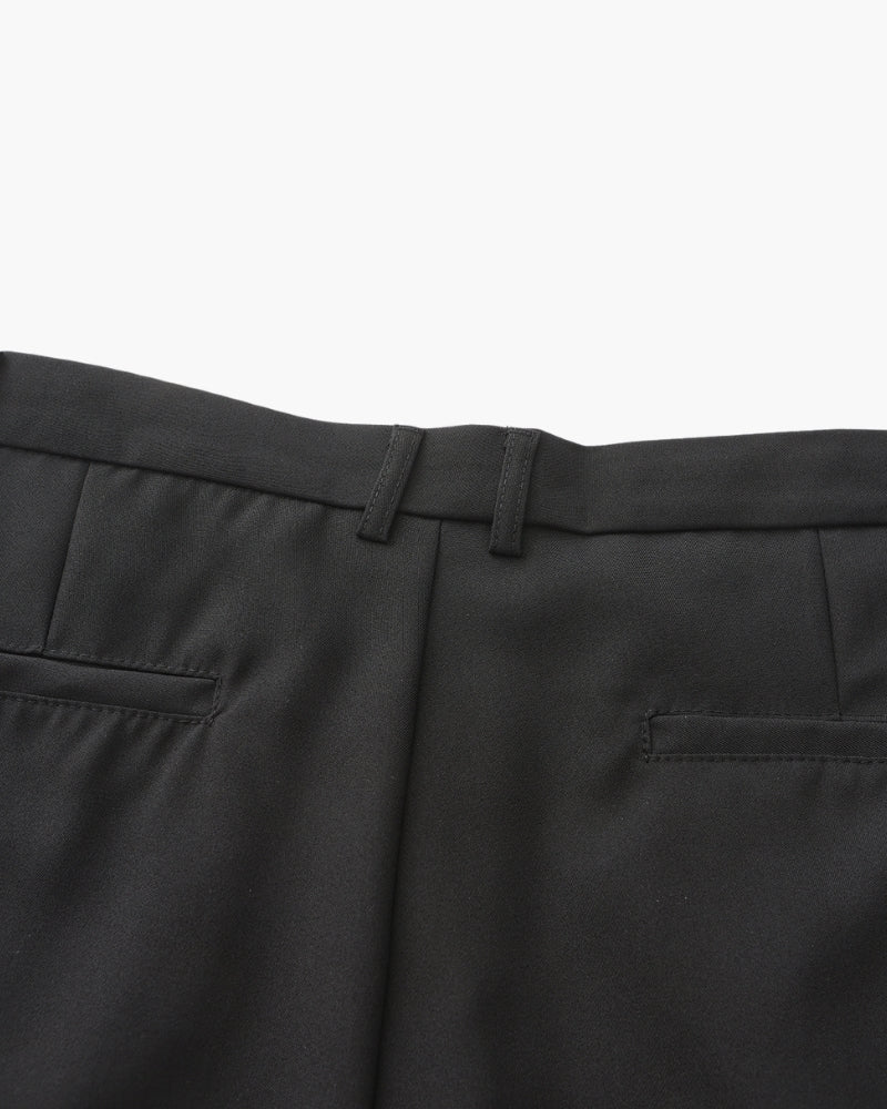 Ravenna Cotton Trouser on-body view black cotton trouser side pocket smart casual editorial