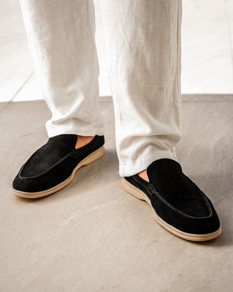 close-up hand-stitched detailing men's suede loafer in caramel