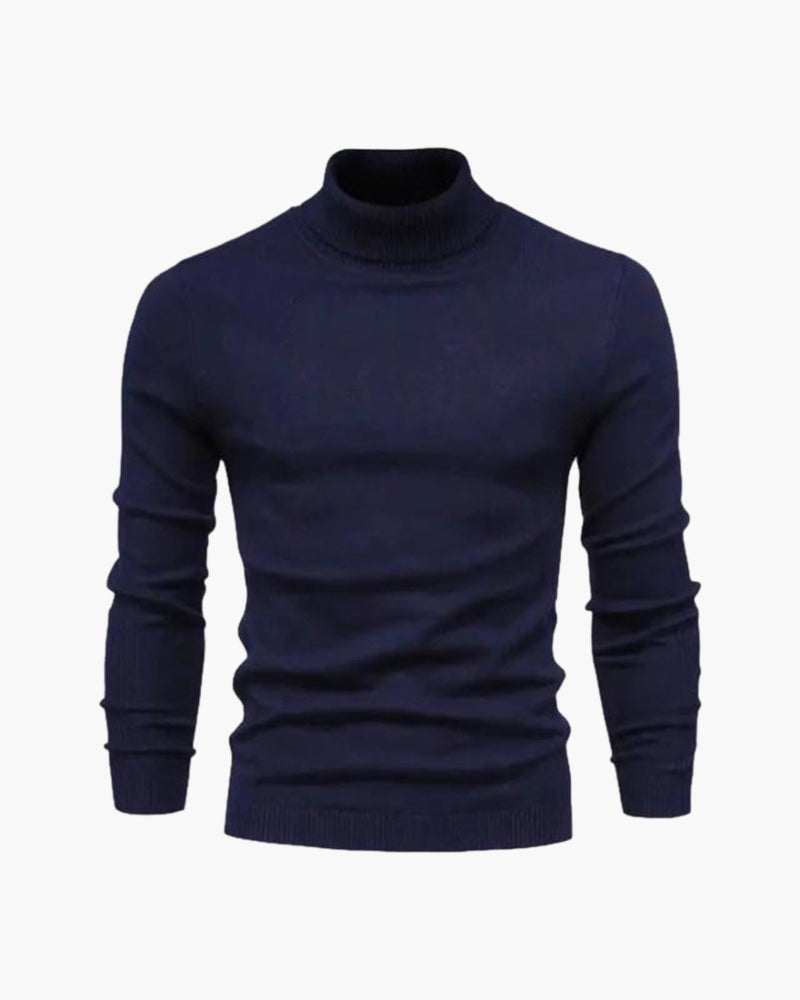 Man wearing merino wool turtleneck sweater in Navy Blue – Sorrento, front view, smooth knit finish.
