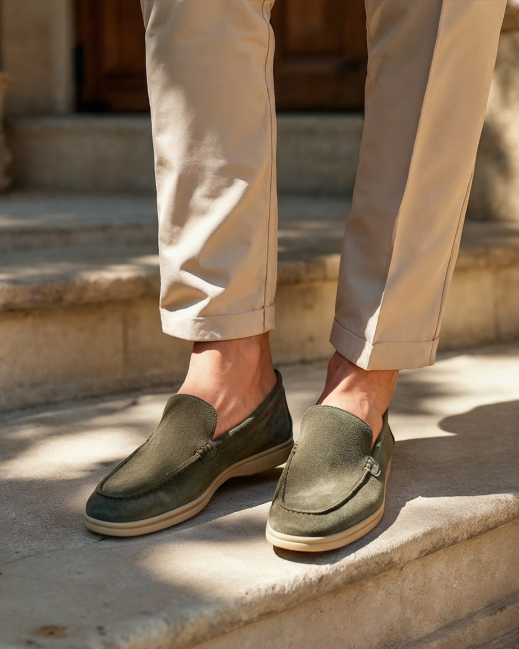side view men's suede loafer in nero clean silhouette