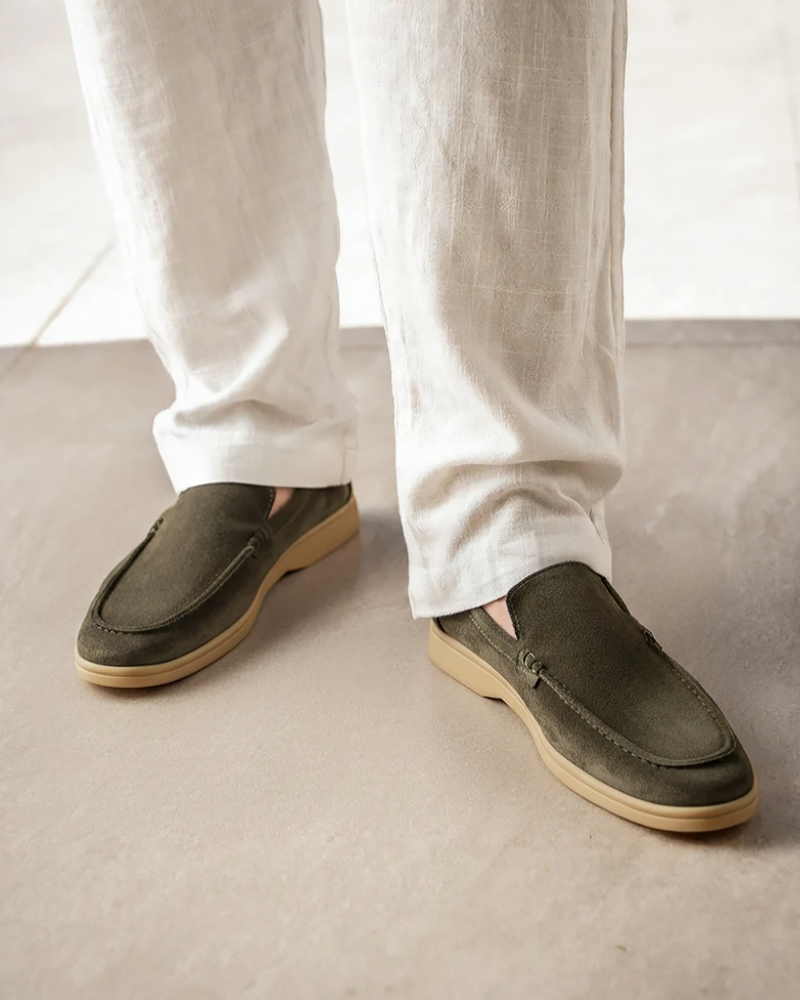 angled view men's suede loafer in sabbia showing structured outsole